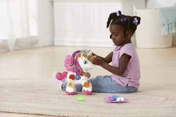 VTech Magical Lights Unicorn – Interactive Light-Up Unicorn with 7 Charms, English & French Learning + Music Mode (Age 1–4) |